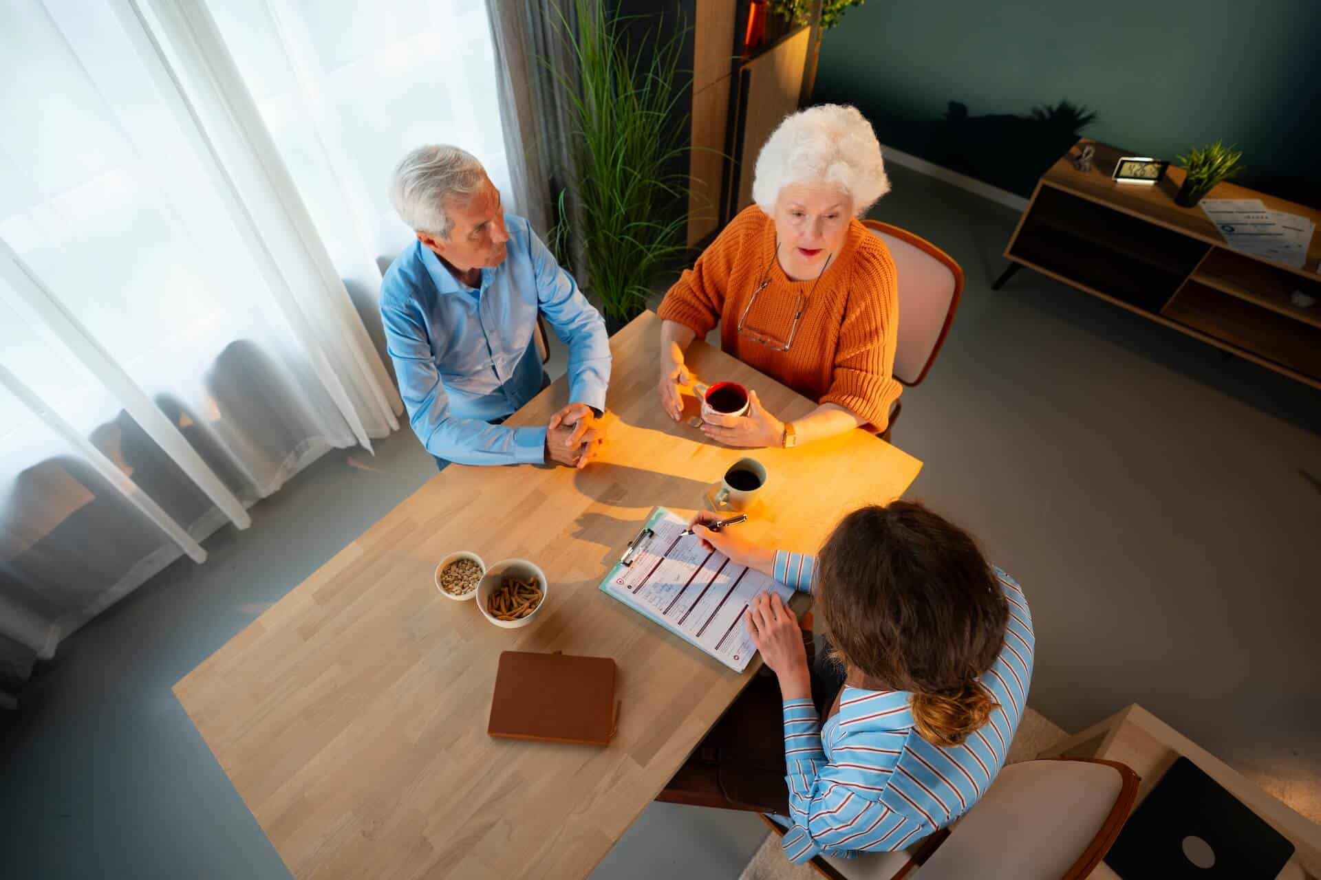 A family meeting with an advisor at a table